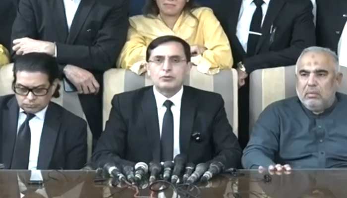 akistan Tehreek-e-Insaf (PTI) Chairman Barrister Gohar Ali Khan (centre) speaking during a press conference on October 19, 2024. — Screengrab via mob